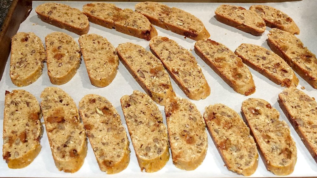 Cut biscotti on lined baking sheet, ready for second baking.