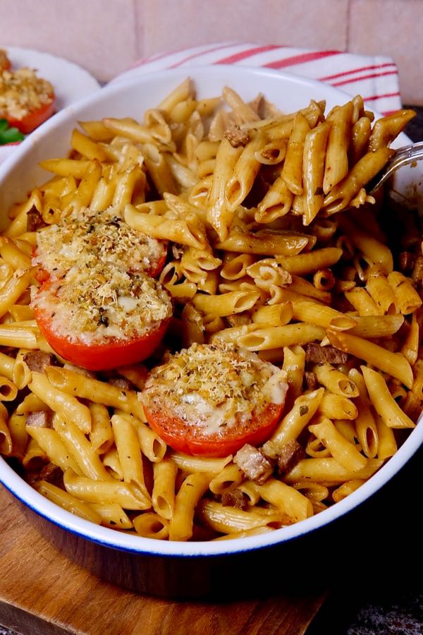 Pasta Tiella in baking dish with Stuffed Tomatoes
