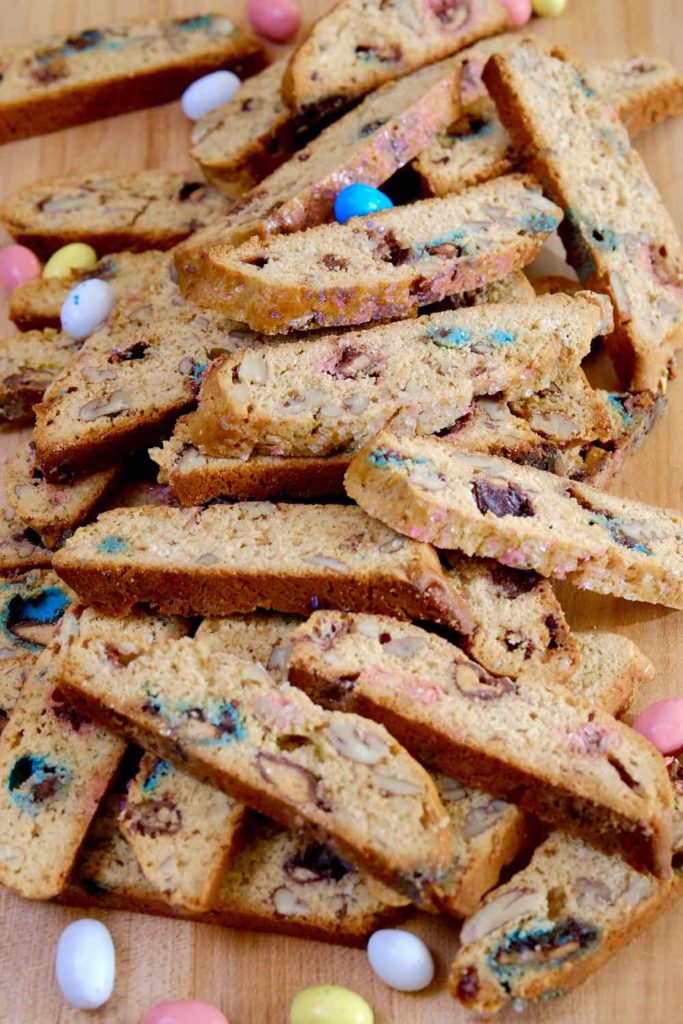 Robin-Egg Biscotti stacked on a maple cutting board