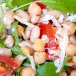 Sicilian Bean and Tomato Salad garnished with Arugula and Grana Padano