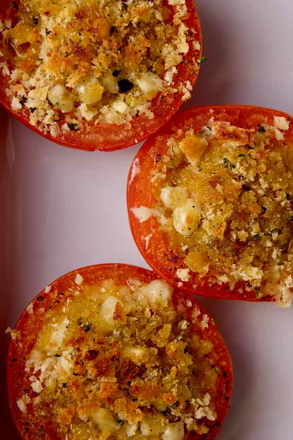 Stuffed Herb Tomatoes in baking dish.