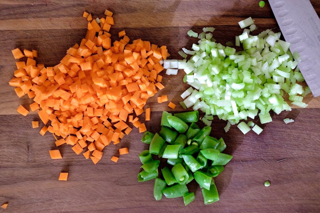 Fried Rice with Cauliflower Veggies on cutting board