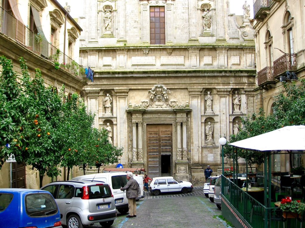 Orange Tree lined Street in Caltagirone, Sicily with parked cars