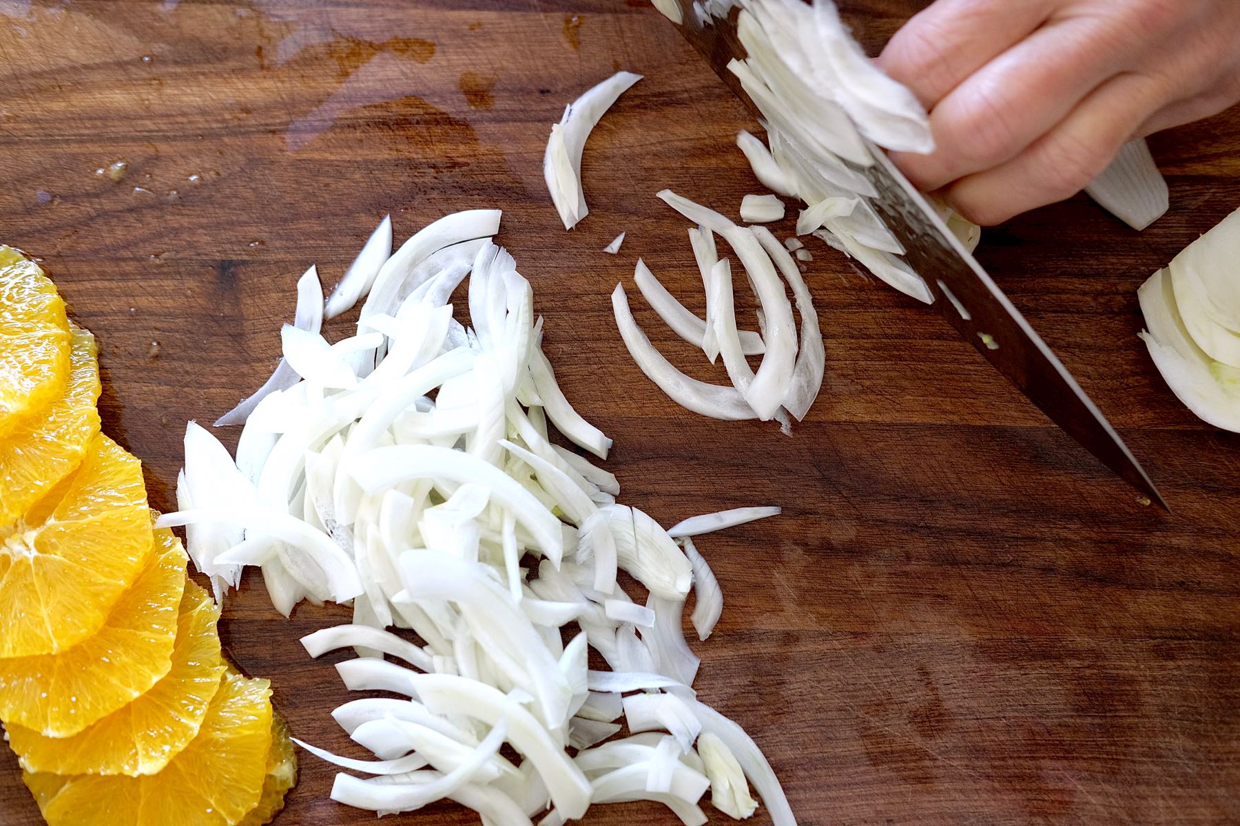 Slicing cored bulb with knife