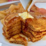 Fluffy Pumpkin Spice Pancakes served with Sauteed Cinnamon Apples and maple syrup