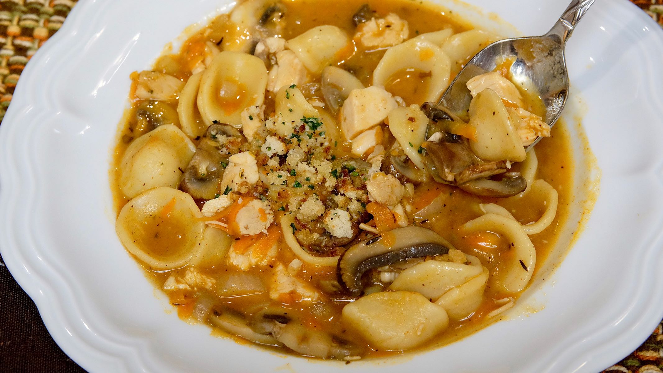 Turkey Tetrazzini Soup with Toasted Breadcrumb Gremolata in white soup bowl