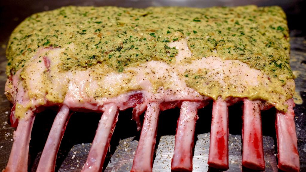 Herb Crusted Rack of Lamb seasoned and packed with fresh herb breadcrumb mixture before bake.