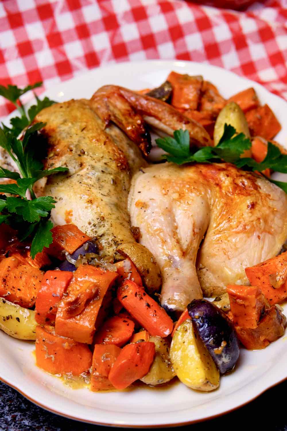 Lemon-Herb Roasted Chicken with Roasted Sweet Potatoes on platter