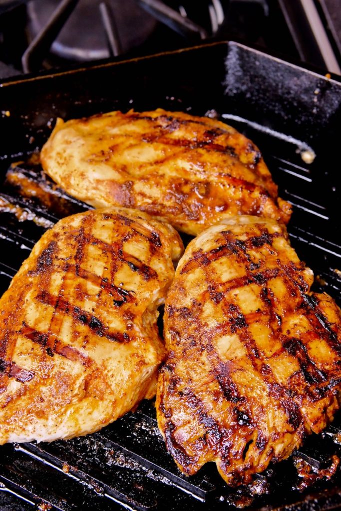 Southwest seasoned chicken breast cooked in cast iron griddle.